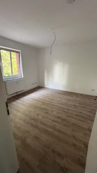 Vierraumwohnung in der Portitzer Siedlung - Wohnzimmer (28022)